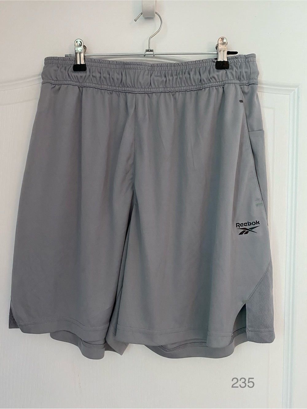 Reebok Men’s Light Gray Athletic Shorts with Mesh Panels